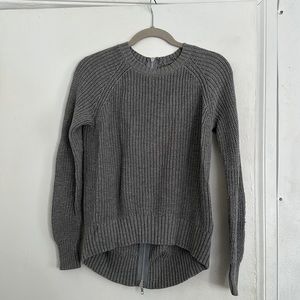Convertible sweater. Can be worn as a pullover or cardigan